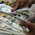Ibovespa fechou em queda e dólar teve rodada de ganhos